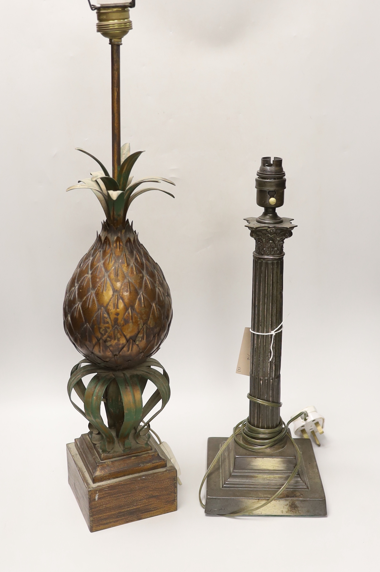 A novelty pineapple table lamp and a plated Corinthian lamp